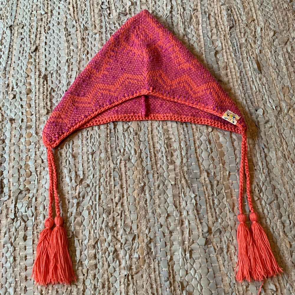 Purple and salmon colored winter hat.